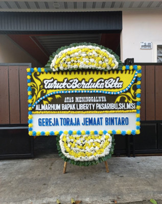 Papan Bunga Duka di Yiginua